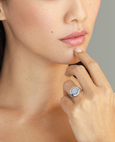 BRIGGS Round Cut Diamond Engagement Ring in Gold and Platinum